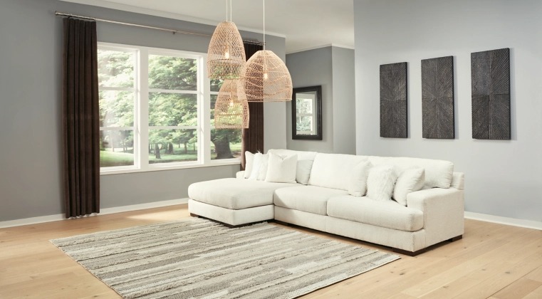 Signature Design by Ashley® Zada 2-Piece Ivory Left-Arm Facing Sofa Sectional and Chaise-1